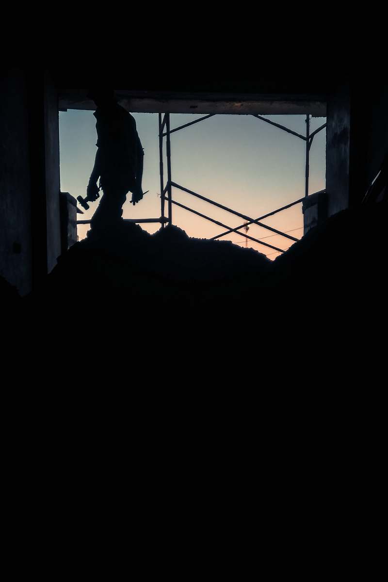 thaltej chowk silhouette of person holding hammer ahmedabad